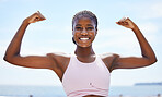 Strong black woman flexing arms, muscle and body power, fitness and wellness in urban Jamaica outdoors. Portrait proud female athlete energy, exercise and happiness of healthy bodybuilder lifestyle