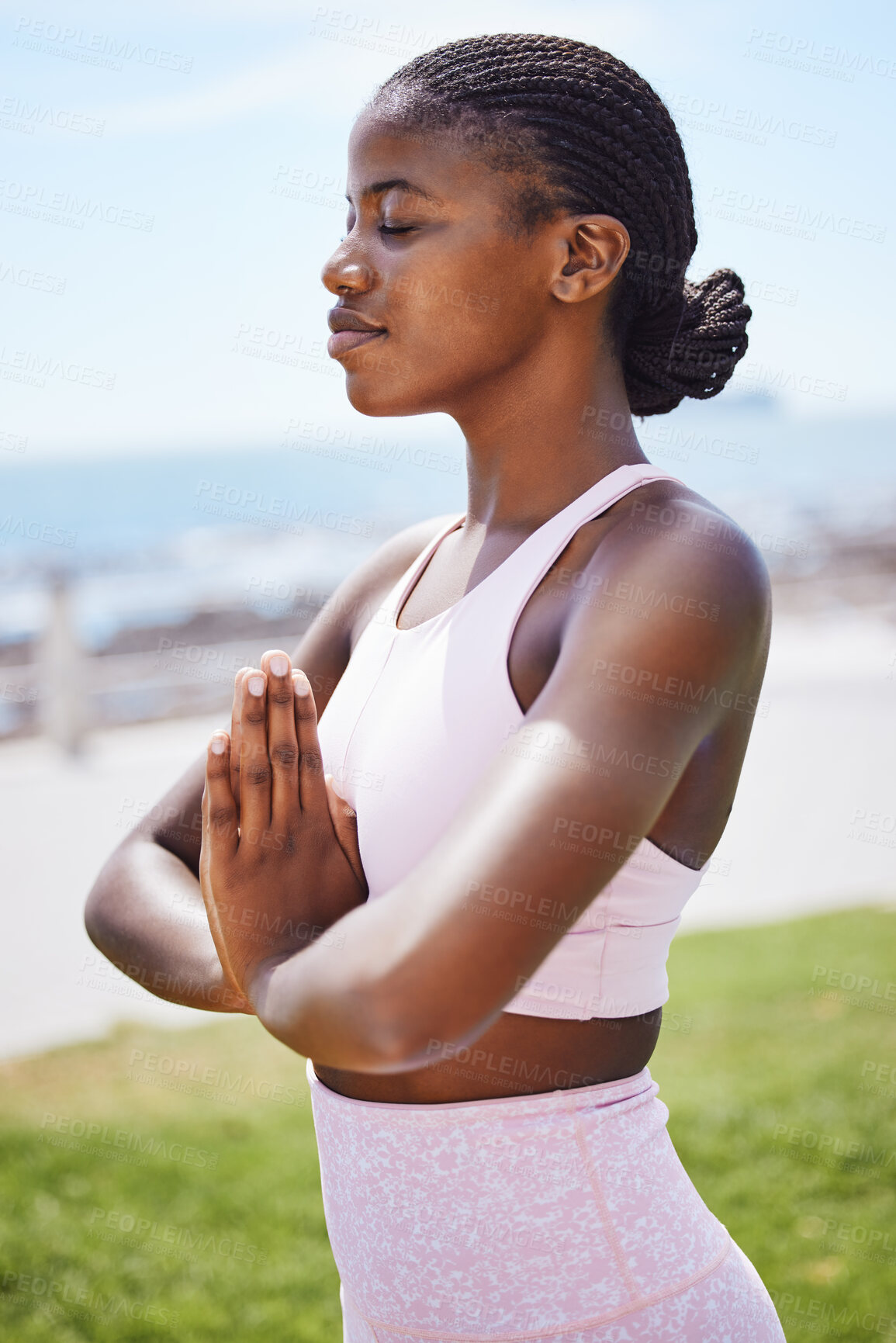 Buy stock photo Nature yoga, meditation and black woman praying for spiritual wellness on the grass in the city of San Francisco. Calm, happy and young African girl doing zen exercise for mind health in a park