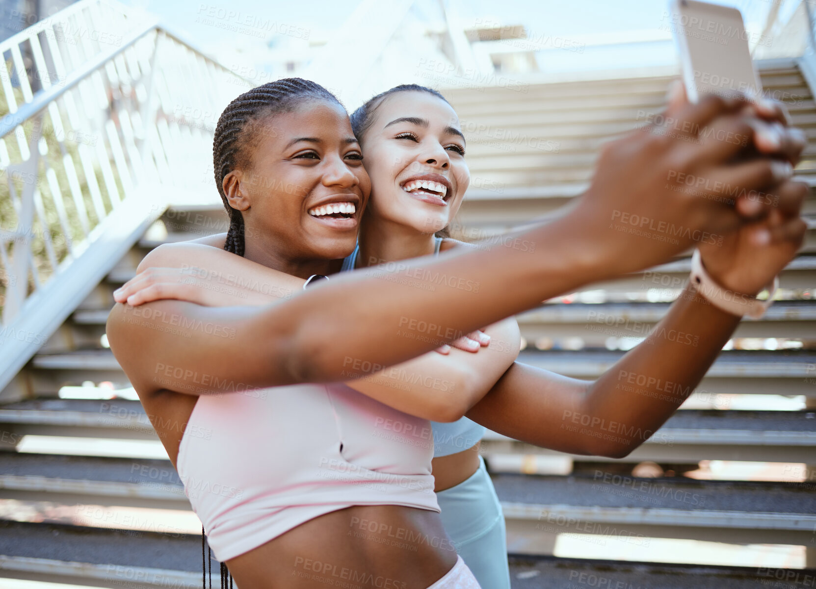 Buy stock photo Exercise, friends and selfie on a phone with happy, relax women bonding and laughing during a workout in a city. social media, content creator and girls posing for online livestream on blog after run