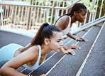 Push ups, personal trainer and women workout on bridge for outdoor training or accountability. Wellness, fitness and strong athlete people exercise together for healthy lifestyle goal and support