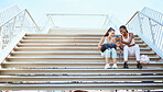 Workout, comic and woman with phone on stairs after doing fitness training in the city of New York together. Runner and black woman talking about funny 5g mobile app after health exercise on steps