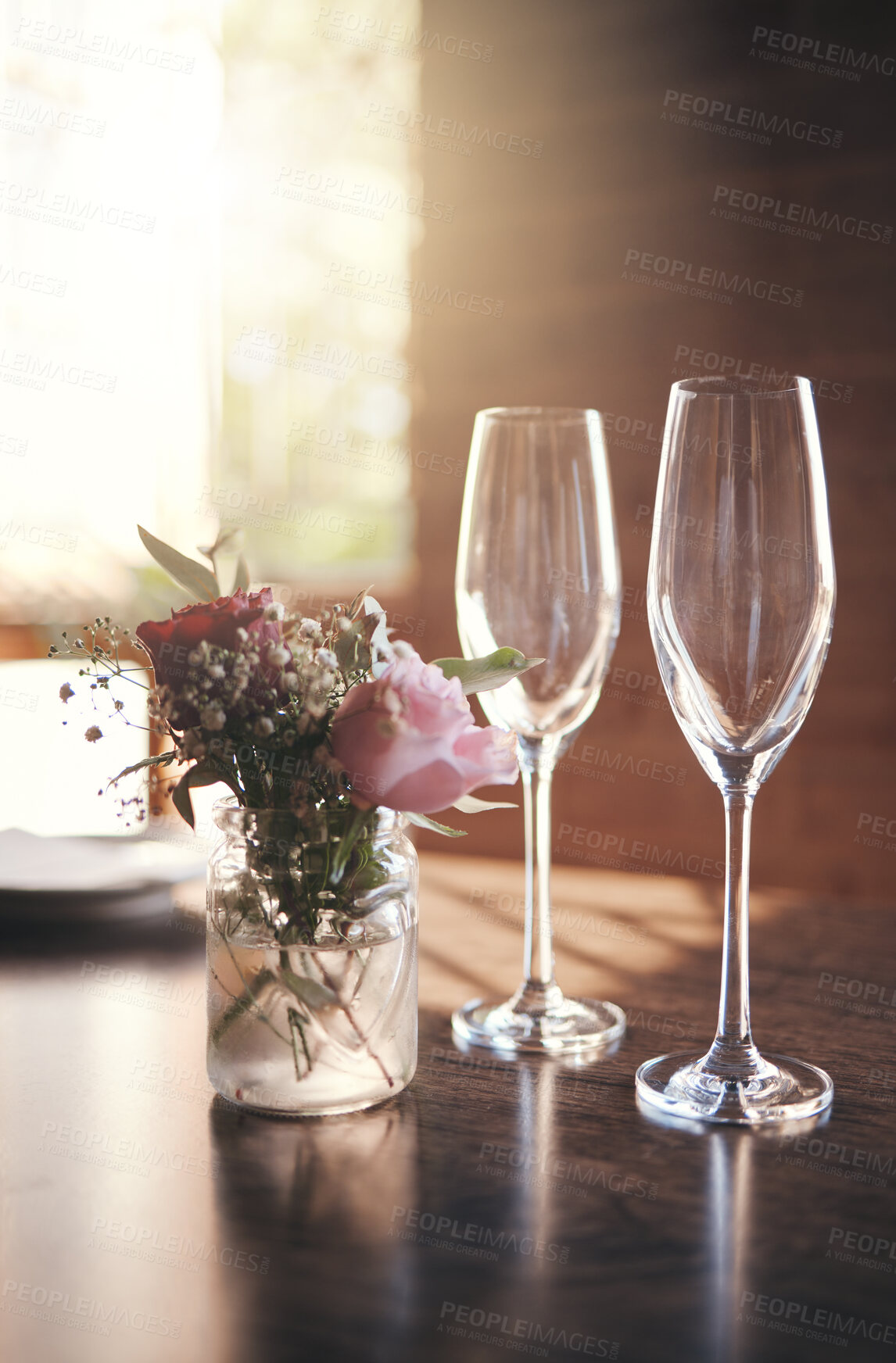 Buy stock photo Champagne, luxury toast and glass for alcohol wine drink in party, birthday celebration or anniversary success. Texture, pink roses and cocktail glasses with house kitchen, home or restaurant flowers