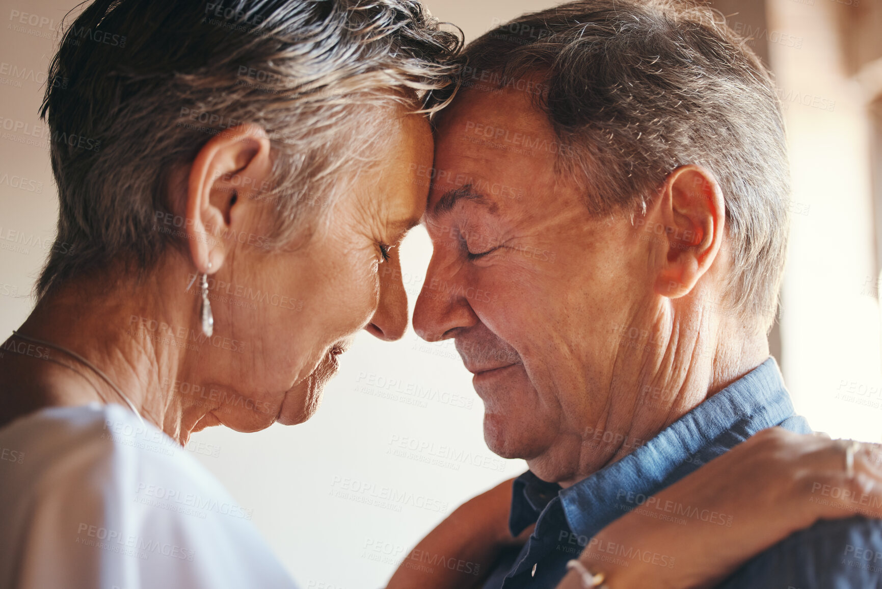 Buy stock photo Love, support and elderly couple hug, commitment and understanding in their home together. Wellness, intimate and romantic seniors enjoy soulmate connection while bonding with affection and romance