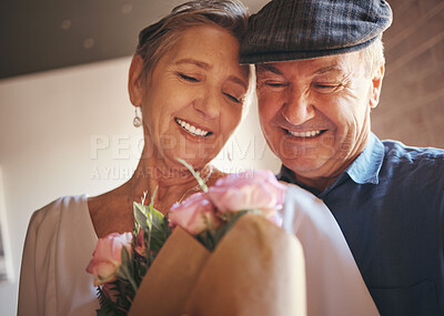 Buy stock photo Love, hug and old couple with flowers as a gift in celebration of a happy birthday, marriage and valentines day. Romance, smile and senior woman with elderly partner to celebrate retirement milestone