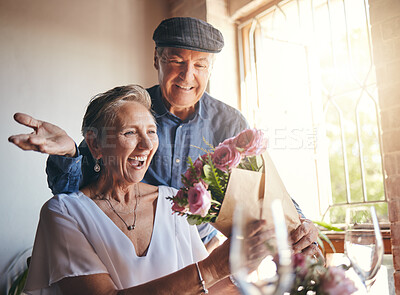 Buy stock photo Surprise flowers, love celebration and senior couple with smile to celebrate birthday, anniversary or romantic event in restaurant. Man and woman giving bouquet of roses as present or gift on a date