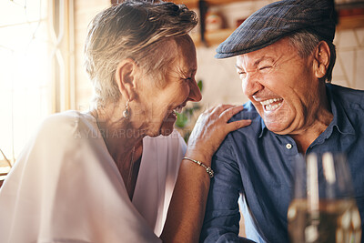 Buy stock photo Senior, couple and laugh after comic joke together in restaurant for bonding time. Smile, man and woman in retirement laughing at funny conversation with love, happiness and comedy in cafe with wine