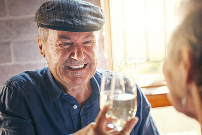 Buy stock photo Champagne toast, celebration and senior couple with smile about retirement at restaurant. Elderly man and woman at dinner to celebrate anniversary, marriage and love with drink of wine and cheers