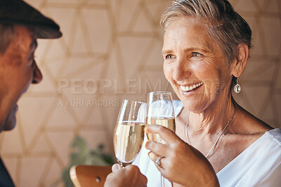 Buy stock photo Senior couple, champagne and drinks toast in house or home for marriage anniversary, celebration event or retirement success. Happy smile, love or elderly man, woman and enjoy alcohol glass together