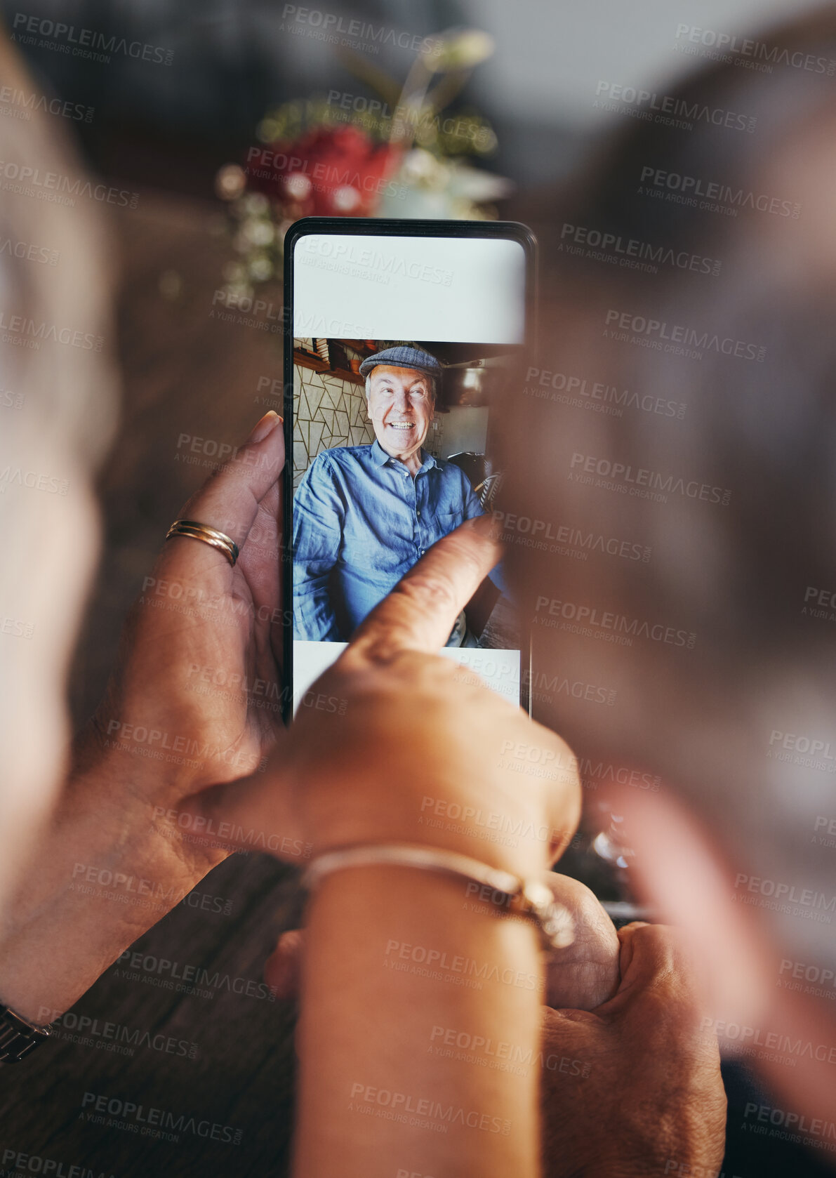 Buy stock photo Love, memory and couple with phone picture to remember romantic date, bond and relax quality time together. Happy, smile and elderly man and woman view digital photo album on mobile smartphone screen