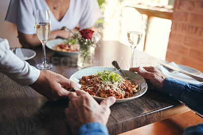 Buy stock photo Food service, wine and couple at table with hospitality from waiter at restaurant for lunch. Cafe worker with plate of pasta for man and woman on date for anniversary or marriage at fine dining cafe