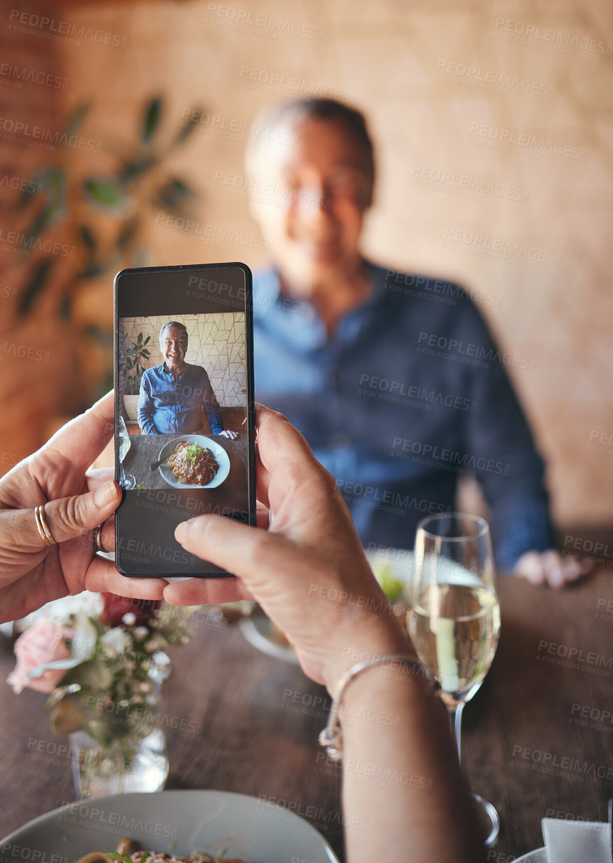 Buy stock photo Happy man, phone screen and photograph in restaurant, cafe and fine dining lunch food for birthday, anniversary and dinner celebration. Couple coffee shop date, senior guy smile and mobile picture