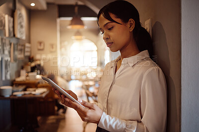 Small business cafe, tablet planning and restaurant manager check online inventory, food menu products or catering service. Waitress worker, coffee shop digital app management or hospitality industry