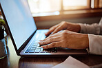 Hands of business woman typing on a laptop doing a online, internet or web search for company marketing research project. Social media advertising worker, employee or expert working on girl campaign