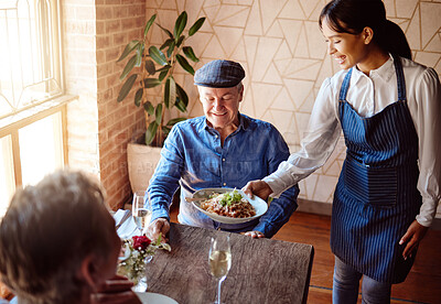 Buy stock photo Love, food and old couple in restaurant with waiter on date for romance, happy and marriage. Retirement, fine dining and luxury with old man and woman at table for dinner service, wine and relax