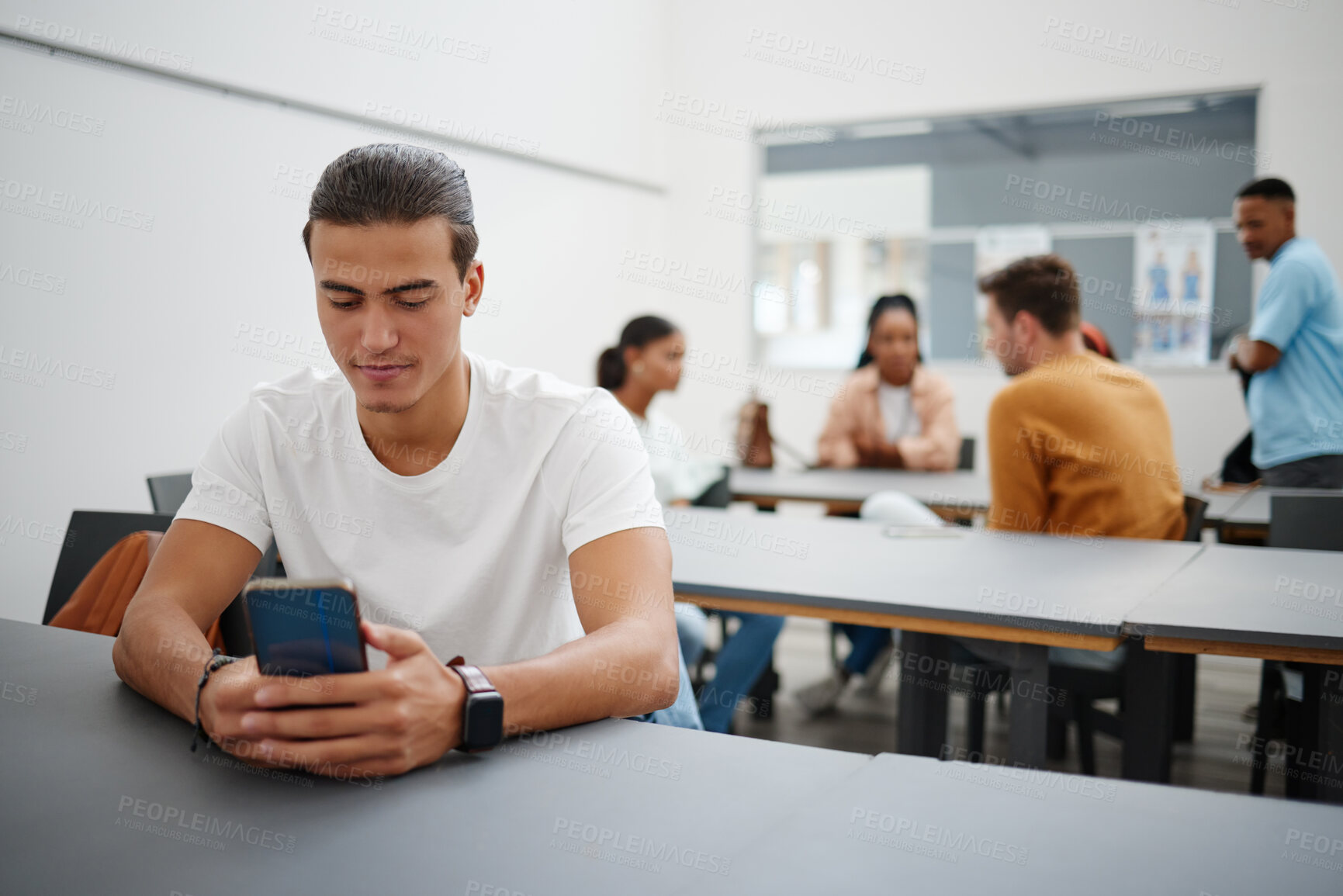 Buy stock photo University man and social media on smartphone in lecture auditorium lesson for internet break. Distracted college student busy with phone text communication on online app in education campus.