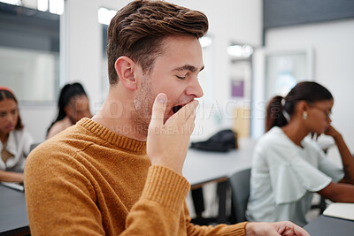 Buy stock photo Burnout, tired student or yawning man sleepy in school, college or university class from overwork, exhausted or mental health. Yawn, scholarship study or education with fatigue or overwhelm to male. 