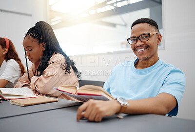 Buy stock photo Reading, books and language student portrait studying in classroom for university education, knowledge and scholarship. College black man in lecture with smile for research, scholarship or learning