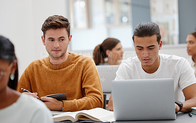 Buy stock photo Education, laptop and student cheating in classroom working on test, exam or research. University, learning and college man writing notes, assignment or busy peeping on friends computer in lecture.