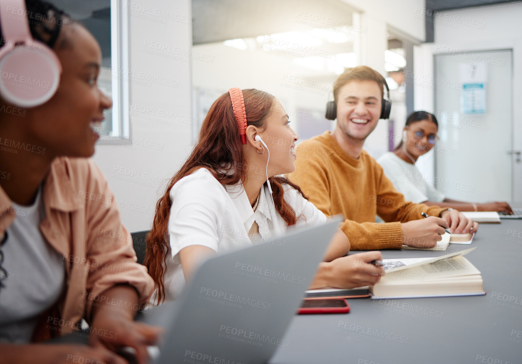 Buy stock photo Music, studying and students learning at a university with notebook and technology in a classroom. Friends with smile for education and audio on headphones while doing a group project at college