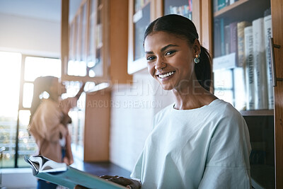 Buy stock photo Notebook, reading and portrait of student in the library at university. Studying, education and young girl from India at college with textbook. Learning, knowledge and study in quiet space with books