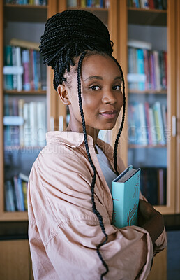 Buy stock photo Black woman portrait, university student and library campus for learning, studying and college education in Brazil. Young gen z girl at reading bookshelf, exam project research and academic knowledge