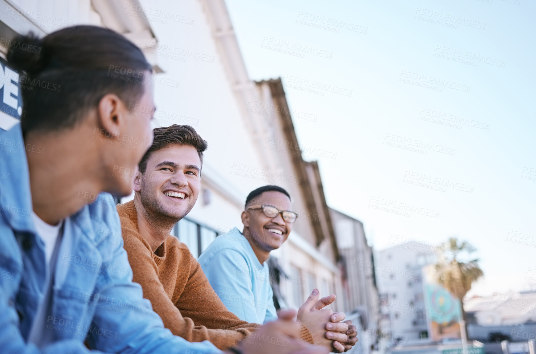 Buy stock photo Friends on balcony, London people relax in city summer sunset lifestyle and party joke by funny young man. Happy gen z men bonding by terrace, outdoor apartment weekend and friendship smile together