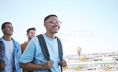 Buy stock photo Student, education or travel with a man and friends walking to class on university or college campus as exchange students. Study, scholarship and learning with a male friend group in a city or town