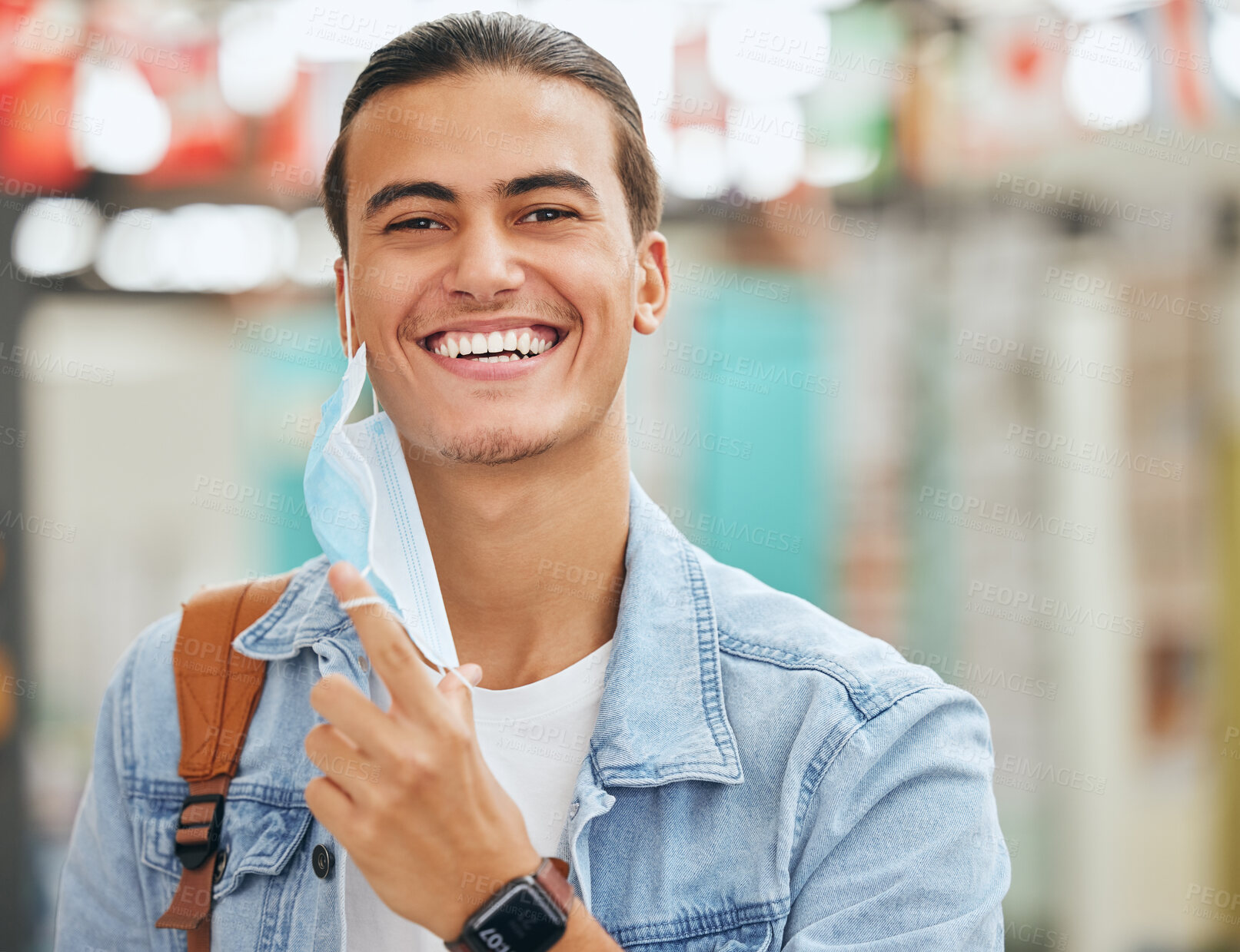 Buy stock photo University student remove face mask, end of covid and safety for learning, education and studying at back to school college in Portugal. Portrait happy campus man excited for corona virus freedom 