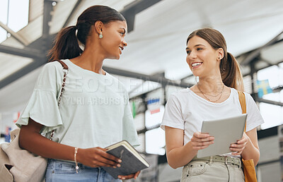 Buy stock photo University, communication and students talking about education with tablet and notebook on campus together. Diversity at college with friends speaking while walking so study for project with tech