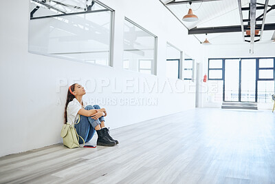 Buy stock photo Stress, burnout and mental health with a woman student thinking about exam, education finance and life stress. Young female frustrated with university, college or school debt in a campus hall or room