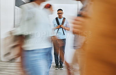 Buy stock photo Bullying, depression and sad university student, black man and mental health problems in busy college. Social anxiety, depressed and lonely campus guy, loser and victim fail in school youth education