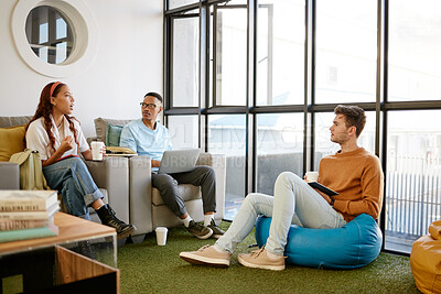 Buy stock photo Advertising, creative and business people in communication with technology and coffee at a startup. Team of marketing employees talking about collaboration on project and planning together with tech