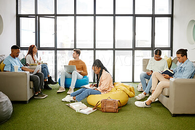 Buy stock photo Education, studying and students meeting for project collaboration, teamwork or research planning in university workspace. Design, creativity and relax gen z group of people in college study team
