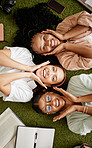 Students, studying and diversity with happy young women lying together showing smile while at college for education and learning. Top view portrait of female friends on campus or on university grass
