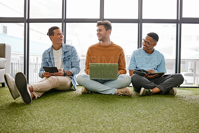Buy stock photo Laptop, tablet and businessmen in creative office working online for startup career. Work, business and digital technology in ecofriendly workplace. Team of men talking on floor in workspace 
