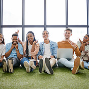 Friends, play and teamwork with a business team working on technology ...