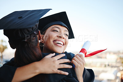 Buy stock photo Graduation, education and hug with woman student friends hugging on university campus in celebration of success or qualification. College, graduate and scholarship with a female and friend embracing