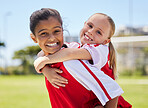 Team, sport and soccer player children with a happy smile having fun on a outdoor football field. Happiness portrait of kids before a sports game together ready for exercise, workout and team fitness