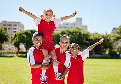 Buy stock photo Children, sport and winner by girl soccer player on field team sports victory with little champion group. Fitness, training and football practice by friends celebrating success after competitive game