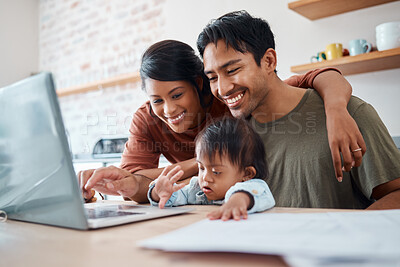 Buy stock photo Mom, dad and baby in kitchen with laptop, happy family from Mexico checking online payment or video call. Mother,  father and child with down syndrome at computer in home streaming educational video.