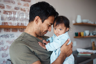 Buy stock photo Baby, father and love while bonding and sharing a precious moment between infant girl and dad parent hugging and showing love, care and support at home. Happy man with cute child in their India house