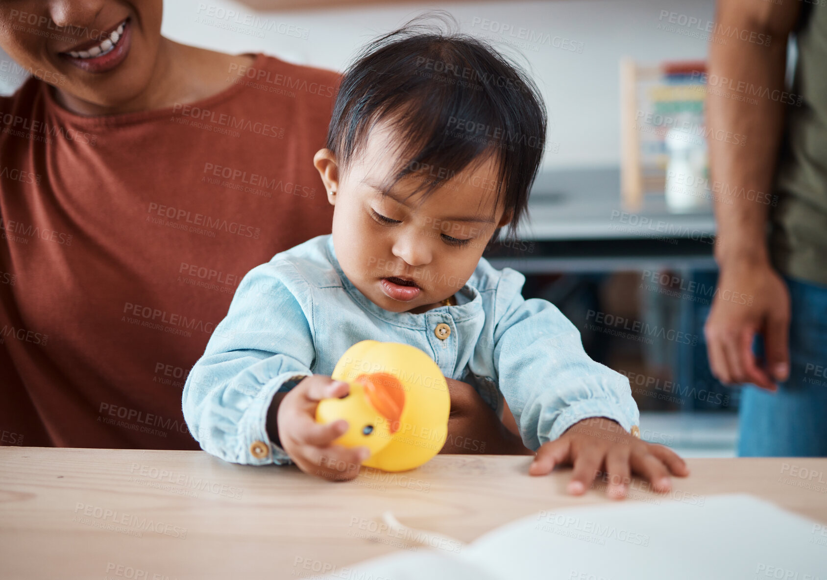 Buy stock photo Sleeping, disability and baby with down syndrome after playing with toy asleep on his mothers lap in family home. Mama, exhausted and tired child with special needs in development with lovely parents