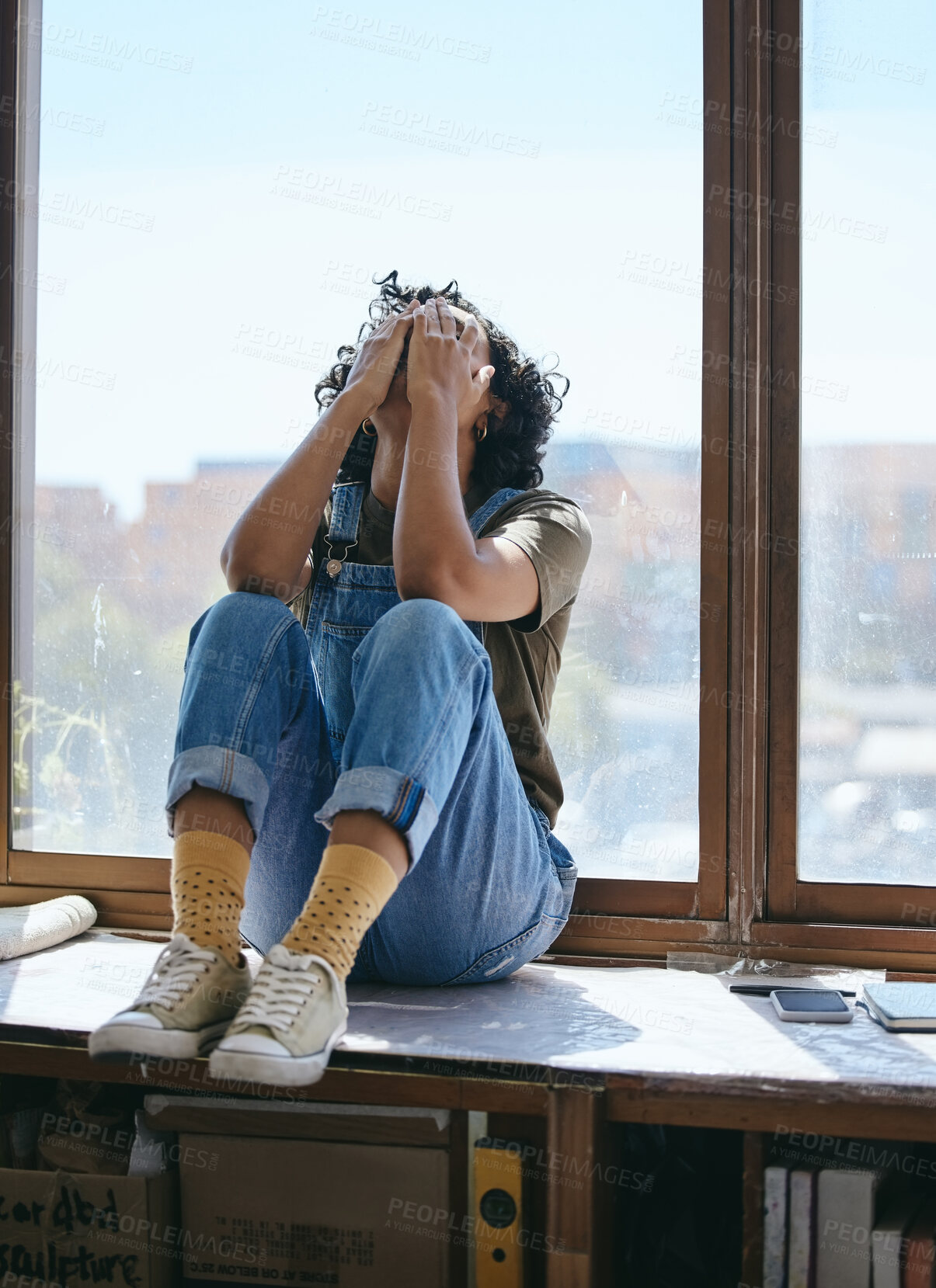 Buy stock photo Tired, stress and creative designer with burnout from working at an advertising startup company. Frustrated, depressed and sad marketing worker with work problem mistake and sleeping by a window