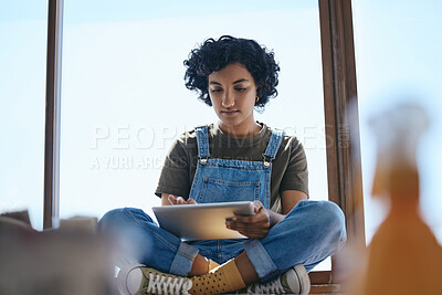 Buy stock photo Woman, digital tablet and graphic design in studio for creative art brand, online shopping website or e commerce logo. Thinking designer, artist or student on technology for research ideas by window