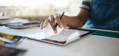 Buy stock photo Hand, tablet and design with a woman small business owner working on the internet in her creative startup. Tech, zoom and online with a female designer or entrepreneur at work in her studio closeup