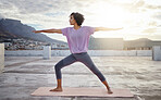 Stretching, yoga and pilates woman on roof outdoor for wellness, healthy and fitness lifestyle with sunshine lens flare. Exercise, workout and meditation sports person training calm healing in city