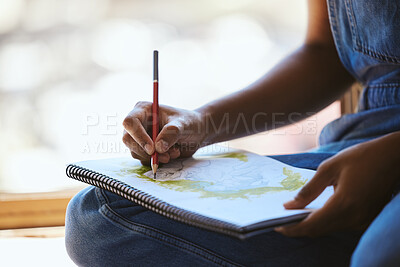 Buy stock photo Creativity, adult color book and woman artist is drawing by window for focus, stress relief and illustrations in studio. Creative, art designer or sitting with hobby, design or sketching in workshop.