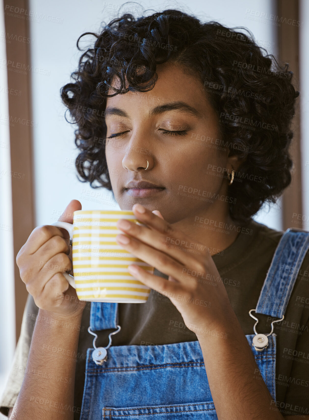 Buy stock photo Woman from India with coffee in the morning in her home, drinking and happy. Young girl having a warm drink, breakfast tea and enjoying aroma from coffee cup. Relax, calm and peace before work