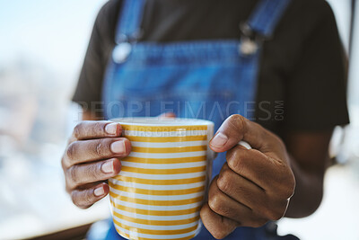 Buy stock photo Hands, coffee shop and relax with a black woman holding a cup to drink while resting or taking a break indoors. Cafe, tea or diner with the hand of a female in a restaurant on a weekend morning