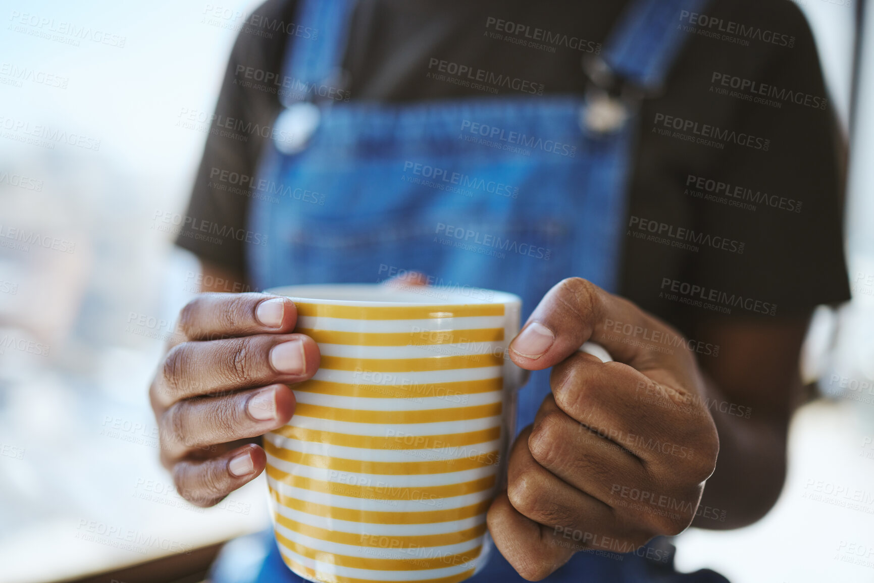 Buy stock photo Hands, coffee shop and relax with a black woman holding a cup to drink while resting or taking a break indoors. Cafe, tea or diner with the hand of a female in a restaurant on a weekend morning